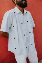 Black Knots on Blue Shirt