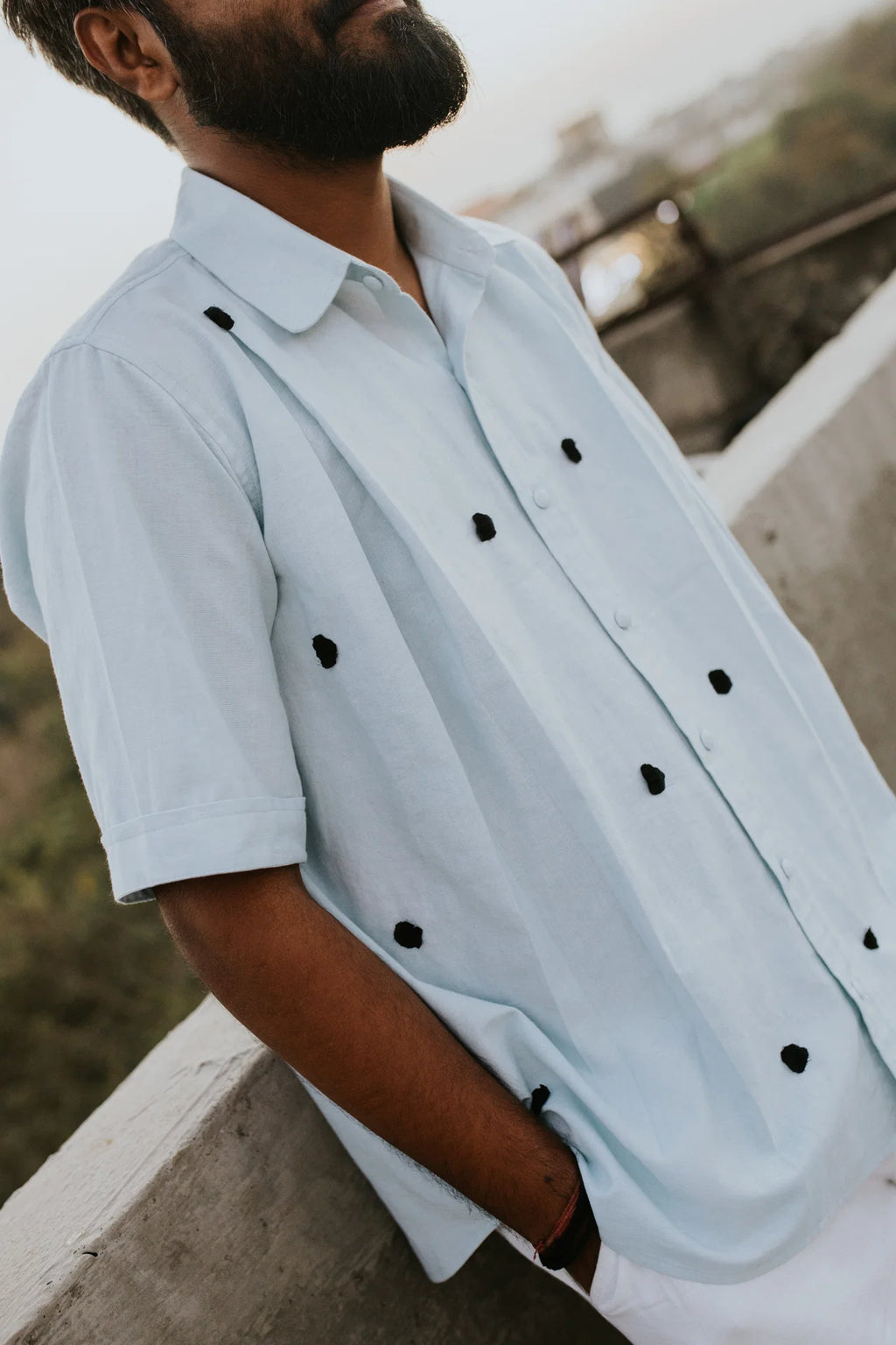 Black Knots on Blue Shirt