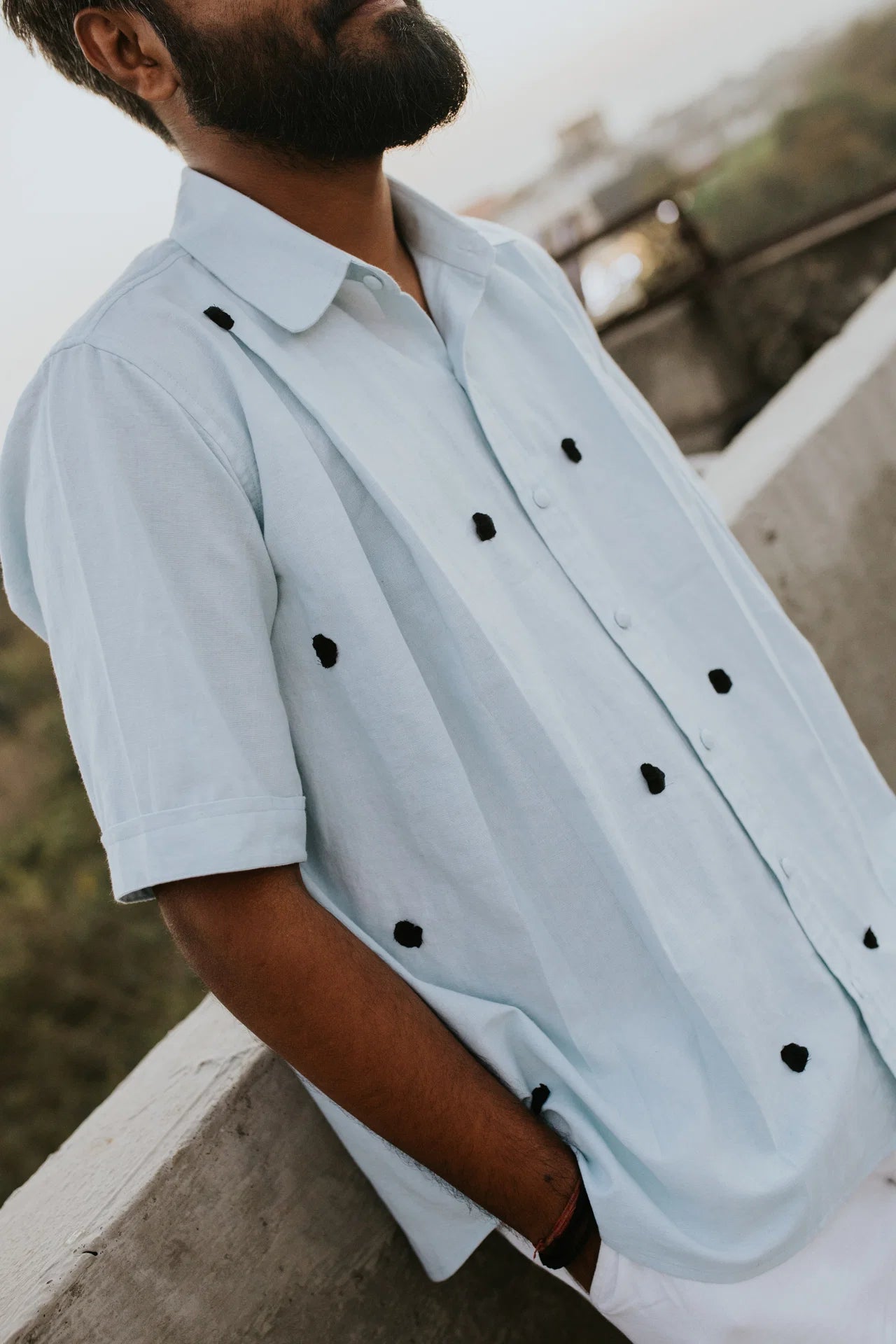Black Knots on Blue Shirt