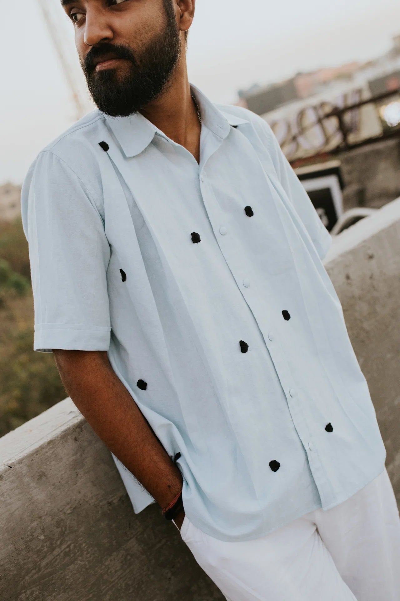 Black Knots on Blue Shirt